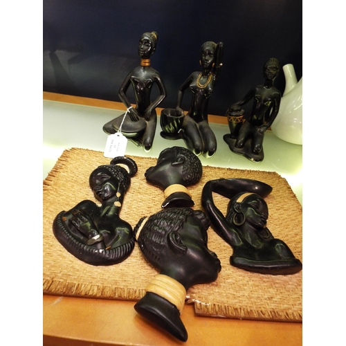 14 - A selection of black painted plaster figurines and bust's