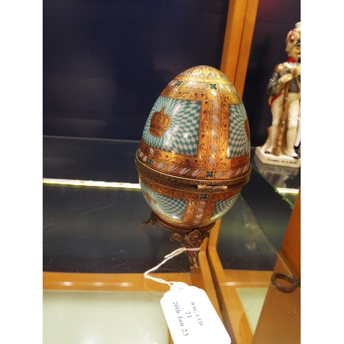 21 - A Sevres of France hand-painted egg with gilt banding and chequered decoration