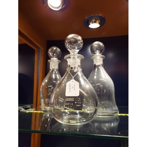 35 - Three large glass decanters