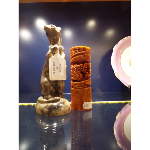 41 - A Chinese carved soapstone seal with a dragon design together with a moulded figure of an otter