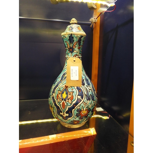 5 - A Persian pottery blue vase and cover A/F