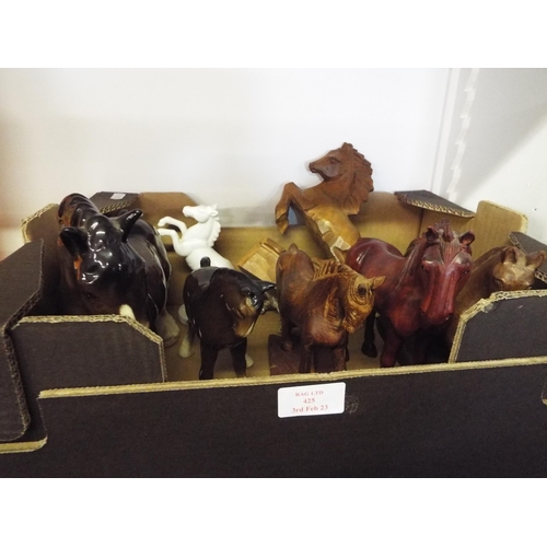 425 - A mixed selection of wooden/china/metal horses