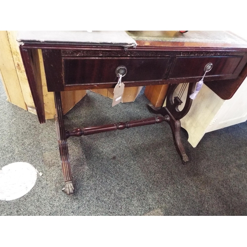 597 - A reproduction leather top sofa table