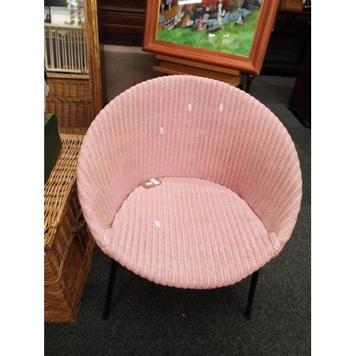 615 - A retro pink painted Lloyd Loom chair