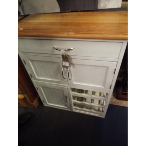 A painted pine kitchen unit with wine rack