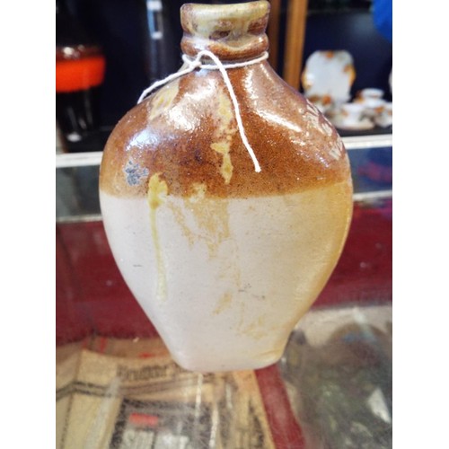 113 - A leather tooled round box with lid together with a stoneware flask shaped bottle, Alford & Sons Woo... 