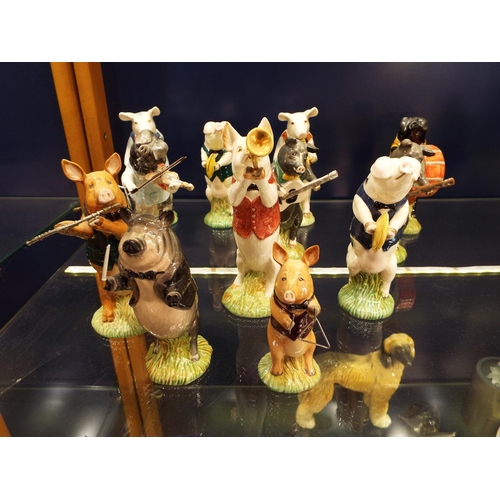 7 - A set of John Beswick figural Bandsmen The Pig Prom to include Michael Bass Drummer, Chris Guitar, B... 