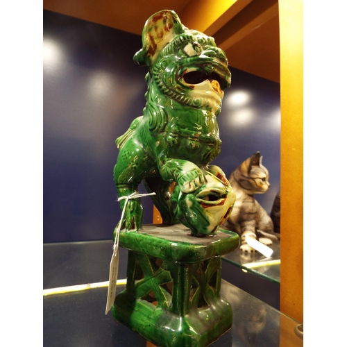 18 - A Chinese pottery green glazed dog of Fu 10