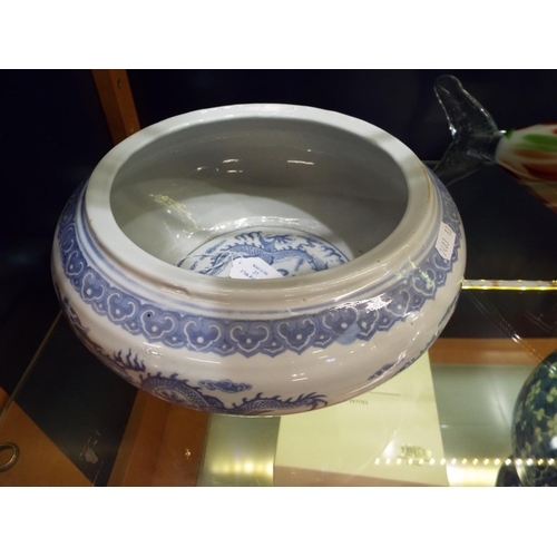 27 - A Chinese blue and white bowl having internal and external dragon decoration with four character mar... 