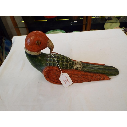 117 - A carved wooden model of a parrot