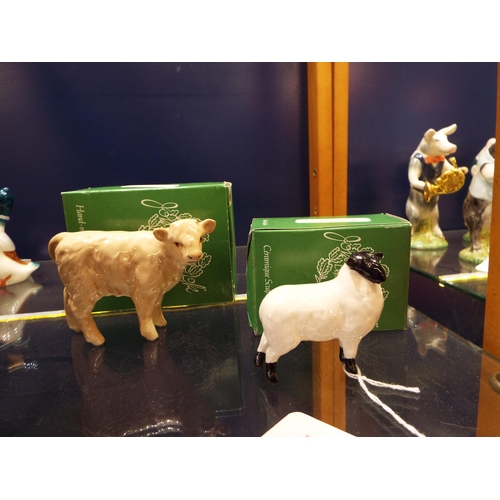 18 - A boxed John Beswick 'Charolais Calf' No C1827 together with a boxed John Beswick 'Black Faced Lamb'... 