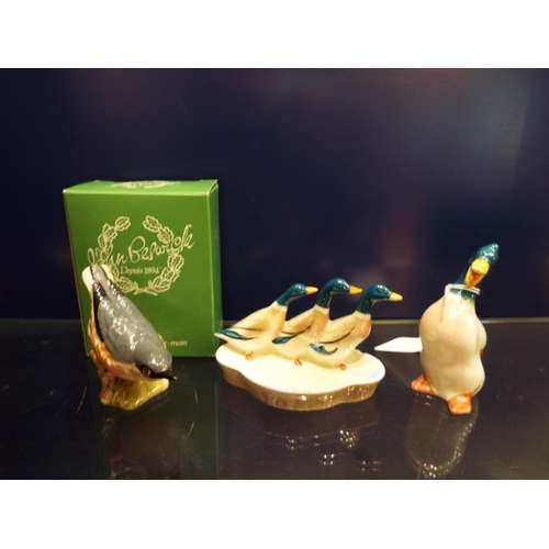 20 - A boxed John Beswick 'Nuthatch' No B2413 together with a vintage Beswick Trio of Mallard ducks trink... 