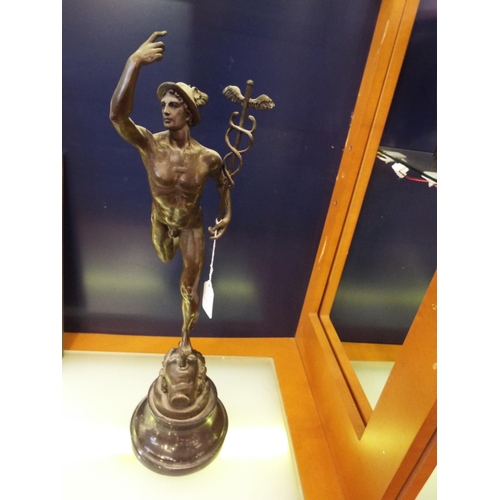 46 - A bronze sculpture of Mercury with winged feet holding Caduceus in his left hand set on a marble bas... 