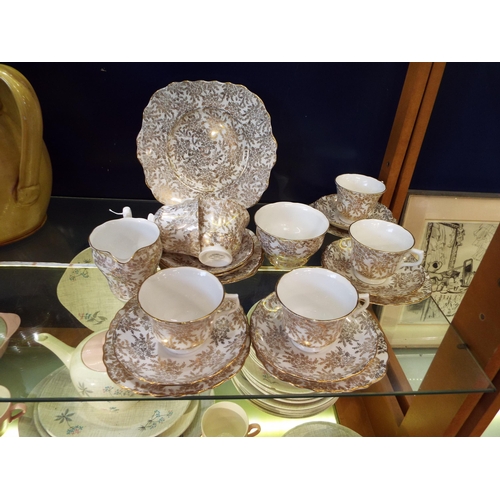 55 - A cream and gilt ground vale tea-set comprising six cups, saucers, side plates, milk jug and sugar b... 