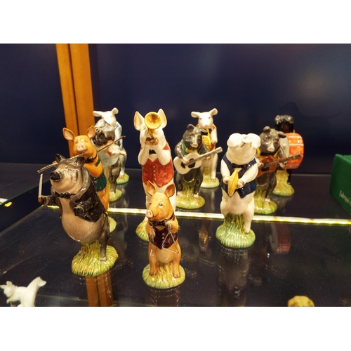 6 - A set of John Beswick figural Bandsmen The Pig Prom to include Michael Bass Drummer, Chris Guitar, B... 