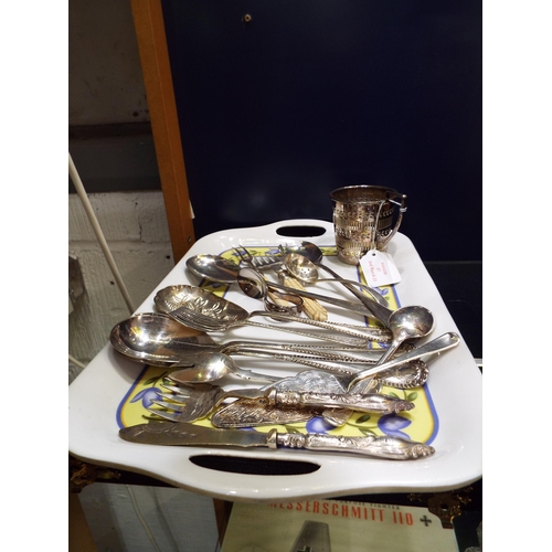 87 - A boxed set of silver-plated soup spoons and assorted cutlery