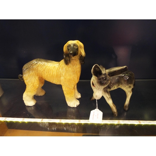 9 - A Coopercraft figural dog and a donkey