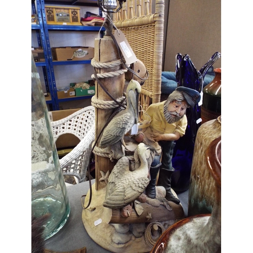 257 - An Apsit Brothers of California 1980's pottery table lamp depicting an old fisherman with nets and t... 