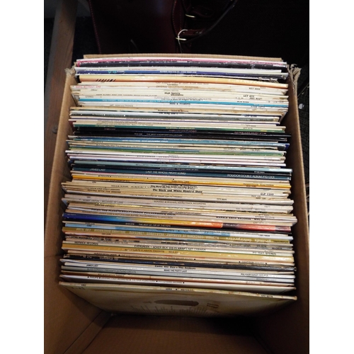 320 - A box of assorted LP records to include Abba, The Seekers etc