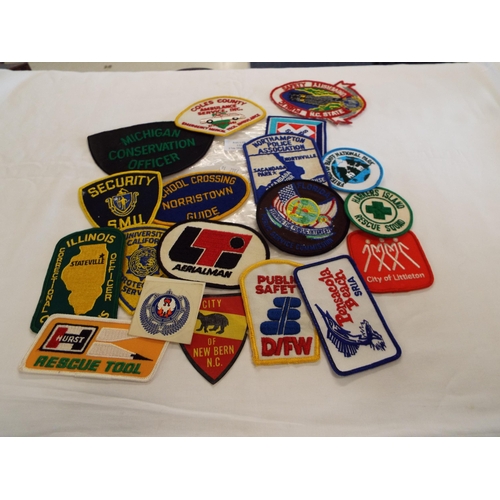 122 - A mixed selection of USA cloth badges to include Pensacola Beach, Harkers Island Rescue Squad etc