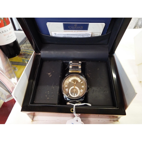 180 - A boxed as new gents Charmex 52785 stainless steel wristwatch the dial having days of the week, lumi... 