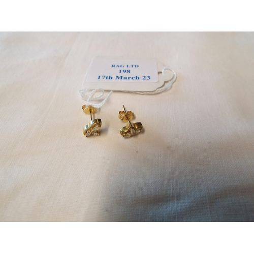 198 - A pair of 18ct gold earring inset with Marquise diamonds approx 2ct