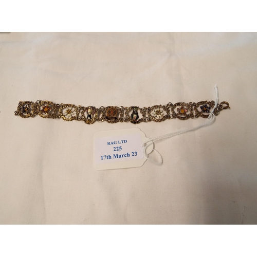 225 - A vintage silver grand tour bracelet