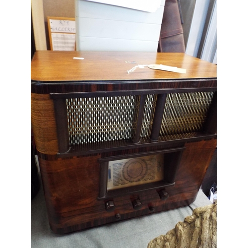 243 - A Marconi rosewood and mahogany cased radio