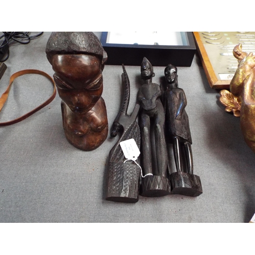 294 - Four hardwood African carvings