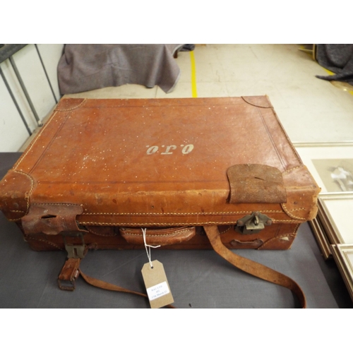 452 - A vintage brown leather suitcase