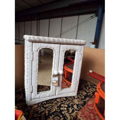 464 - A white painted wicker wall hanging cupboard