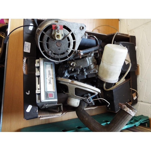 501 - A box of spare parts for a late 1960's Ford Zodiac to include fuel bowl, wiper motor, radio, horn, w... 