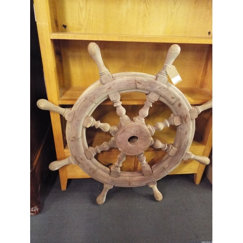 527 - A vintage eight spoke ships wheel