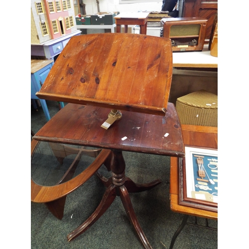 567 - A stained pine two tiered Lectern with four splayed supports