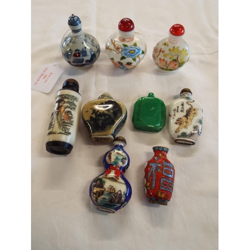 184 - A quantity of Chinese perfume bottles