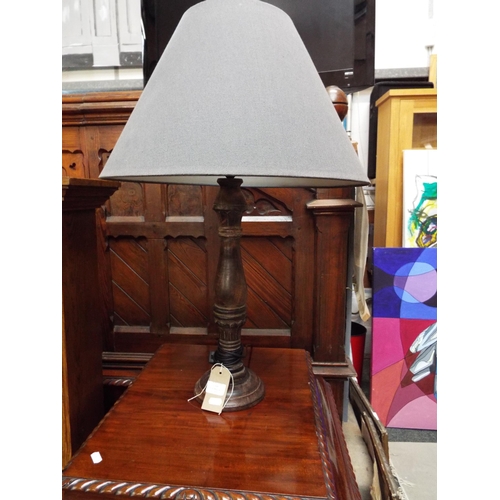 668 - A pair of stained wood table lamps