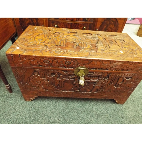 676 - A Chinese carved wooden Camphor chest