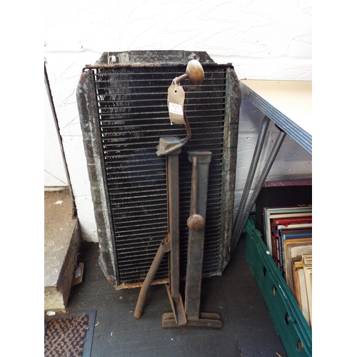 695 - Possibly a late 1960's radiator, not tested together with two vintage car jacks