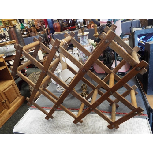 696 - A wooden wine rack