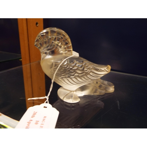 10 - A Lalique of France glass bird figure, signed to base