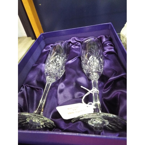 147 - A boxed pair of Edinburgh crystal champagne flutes