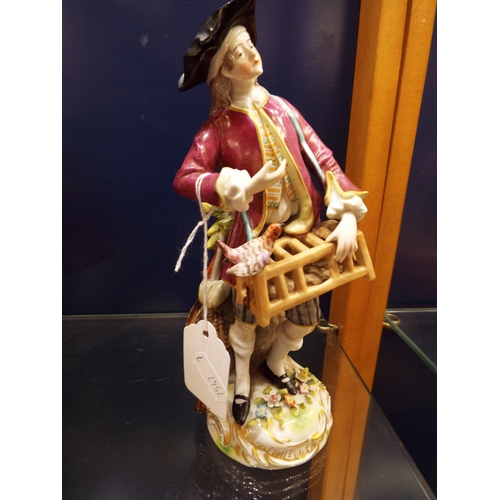 17 - A Saxony porcelain figurine of a gentleman with his hunting catch