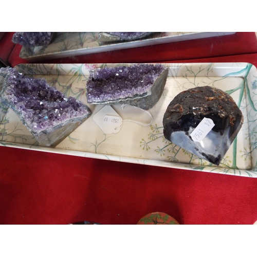 176 - Three amethyst geode stones