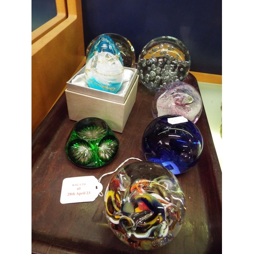 45 - A mixed selection of glass paperweights to include Caithness