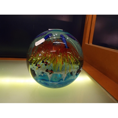 55 - A large Murano glass paperweight with bubble and fish inclusions