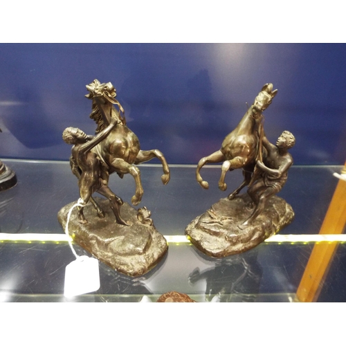 6 - A pair of bronzed Spelter Marley horses with riders