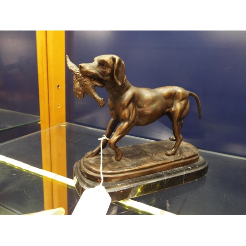 9 - A bronzed figure of a Labrador with pheasant mounted on a marble base