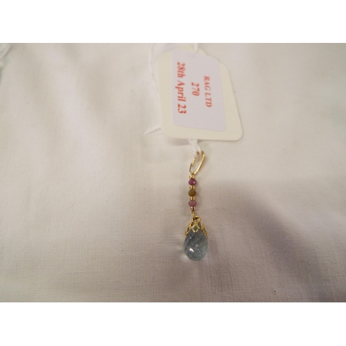 270 - A tear drop aquamarine and gemstone pendant having yellow metal pinch clip clasp