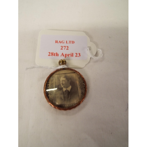 272 - A vintage yellow metal photograph pendant