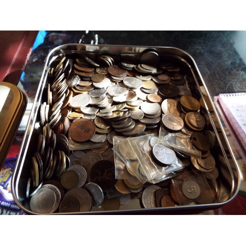 152A - A tin containing a mixed selection of English and foreign coins